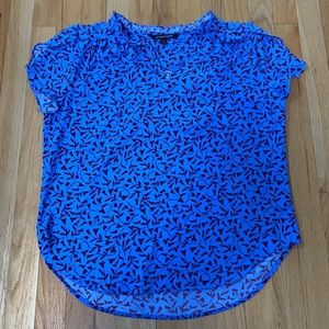 Blue blouse with red foliage design